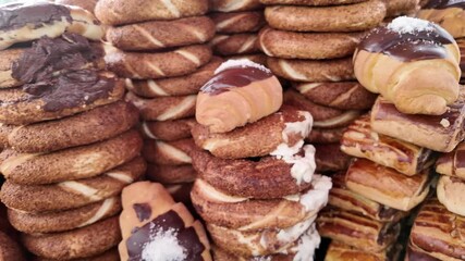 Fresh baked goods at local market in the morning sun