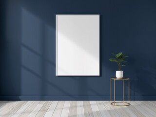 Modern interior mockup with a blank white poster frame on a dark blue wall. A green plant on a gold stand adds a fresh touch.