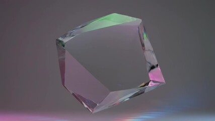 Isolated complex transparent crystalline geometric polyhedron rotating slowly capturing and refracting colorful studio lights against a neutral background colorful, object, transparent