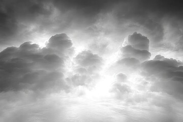 dramatic backlit storm clouds towering over a calm reflective water surface, moody and ethereal atmosphere