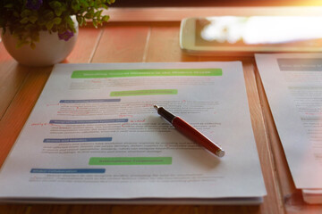 proofreading worksheet on wooden table