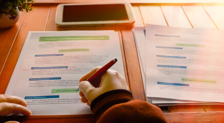 proofreading worksheet on wooden table