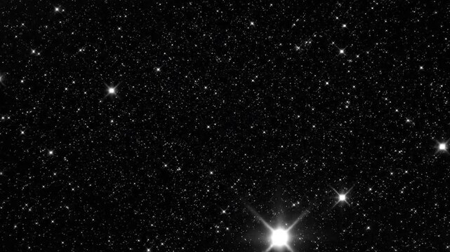 Glittering pinpricks pierce the inky void