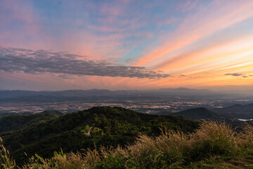 Beautiful Landscape of mountain layer in morning sun ray and winter fog at Doi Laem, Mea Ai in Chiangmai, Thailand