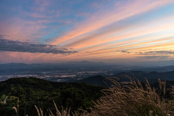 Beautiful Landscape of mountain layer in morning sun ray and winter fog at Doi Laem, Mea Ai in Chiangmai, Thailand