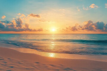 Serene golden sunrise over a calm ocean with gentle waves lapping a sandy beach, soft footprints in wet sand and glowing clouds along the horizon
