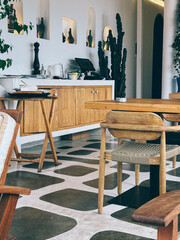 Interior view of a modern cafe with minimalistic design and natural elements