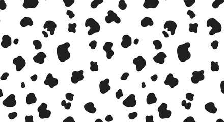 Fototapeta premium Dalmatian pattern background with black spots on white.