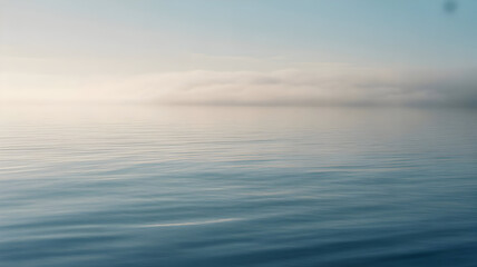 Obraz premium Serene ocean illustration with calm blue water reflecting a soft hazy sky and distant horizon clouds