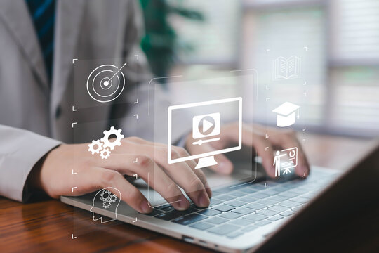 Hands typing on a laptop with floating digital icons for e-learning, training, target, process, knowledge, symbolizing online education, skill development, digital learning platforms, modern training