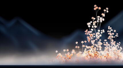 A cluster of small, delicate flowers in shades of white and orange are illuminated by soft light, set against a dark, misty mountain landscape.
