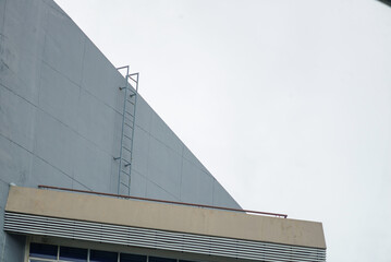 Fototapeta premium Industrial Building with Metal Ladder View