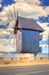 Wooden windmill a tourist attraction in the old city of Nessebar in Nessebar, Bulgaria, Europe