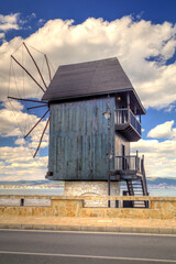 Wooden windmill a tourist attraction in the old city of Nessebar in Nessebar, Bulgaria, Europe