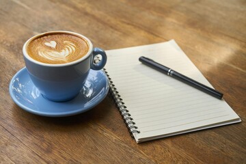 Coffee Cup Notebook on Table