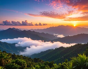Majestic mountainous landscape at sunrise with vibrant colors of the sky and clouds, tropical forest