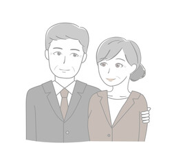 寄り添うスーツのシニア男女