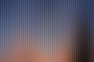 A textured background of vertical ribbed lines in a gradient of blue and orange hues creates a subtle yet captivating visual effect.