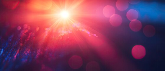 Luminous starburst with colorful bokeh on dark background