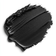Swatch of dense, glossy black cream or paste on white
