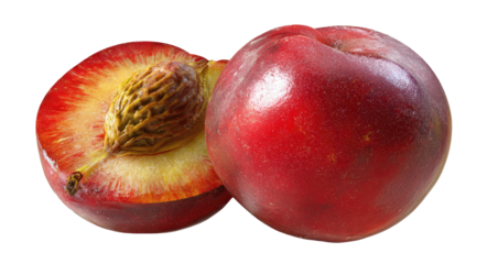 Whole and halved ripe red nectarine with visible pit, on black background