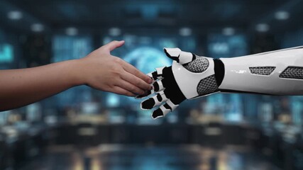 A creative video showing a human hand reaching out to a robotic hand, symbolizing the partnership between artificial intelligence and human collaboration in a digital world. Auvana - Powered by Adobe