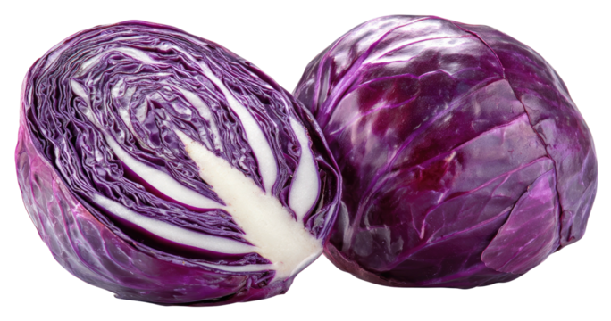 Vibrant red cabbage, one whole and one halved, revealing inner crispness