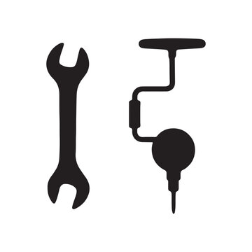 Wrench and hand drill isolated on for repair or construction