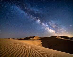 Sweeping desert sand dunes at night under Milky Way and starry sky