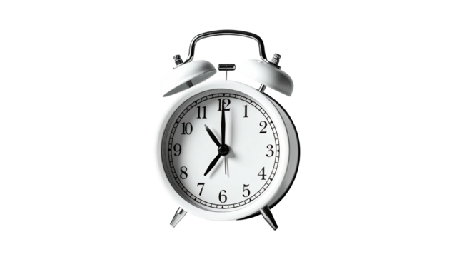 White bedside clock showing 700 isolated on black