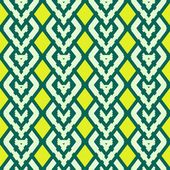 Classic chevron design in a zigzag lines decoration abstract seamless pattern on green and yellow background