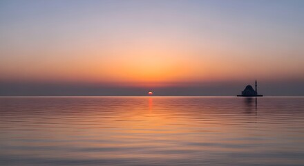 Obraz premium Serene Sunset over Calm Water with Mosque Silhouette and Vibrant Sky