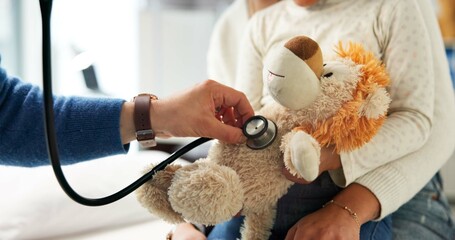 Stuffed animal, stethoscope and hands with child in hospital for heartbeat, consulting and...