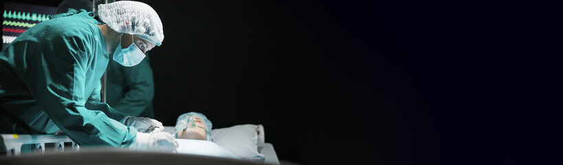 Hospital, procedure and surgeon with patient, surgery and gloves for emergency care or mockup...