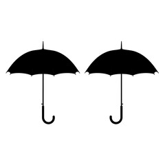 Two black umbrella silhouettes isolated on white background