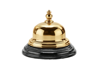 Polished brass service bell on black, ornate base