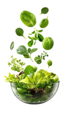 Fresh greens falling into a clear bowl