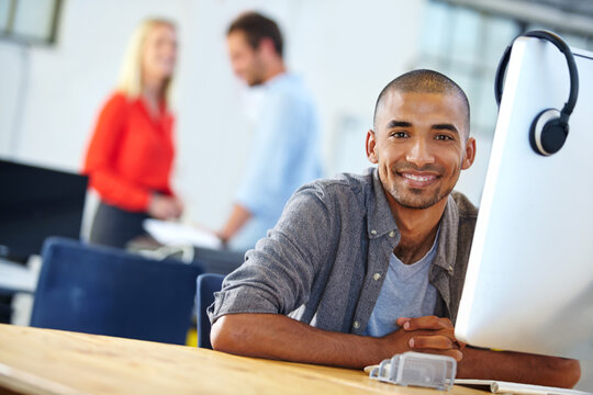 Computer, portrait and smile of graphic designer man in coworking office for development. Engineering, pc and programming with happy developer person at work for design in small business tech startup