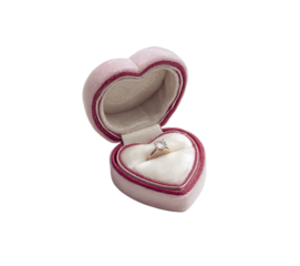 Pink velvet heart ring box with diamond ring isolated on a transparent background