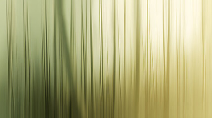Soft silhouettes of vertical bamboo stems rendering an abstract artistic natural background with smooth motion blurred lines and a green to yellow color gradient of light and shadow