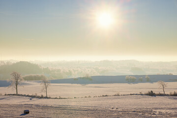 Rural view at a rolling landscape a cold sunny winter day