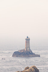 Lighthouse La vieille on a rock at the Pointe du raz in Bretagne
