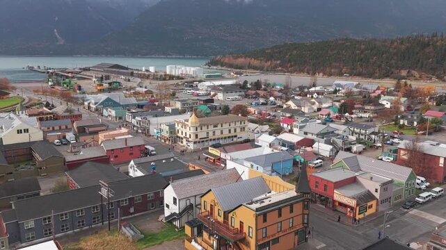 Aerial low close-up shot of historic Skagway, Alaska near the end of the fall tourism season. 4K