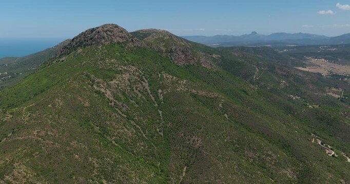 Rugged Mountainous Landscape At Buggerru Coastal Town In Sardinia, Italy. Aerial Drone Shot