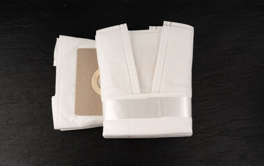 New paper vacuum cleaner bag. Clean disposable container or pouch