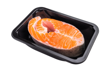 Raw salmon cut placed in a black tray against a clean white surface showing marbling and freshness ideal for market ads and food promotions.