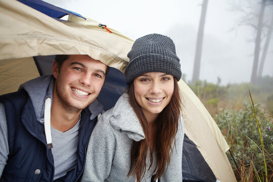 Woods, camping or portrait of happy couple with tent for vacation, nature or travel adventure in winter. Outdoor holiday, love or people together weekend bonding, care or environment for relationship - Powered by Adobe