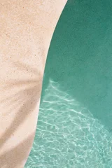 Turquoise pool water and smooth stone edge, minimalist summer resort texture © Yevhenii