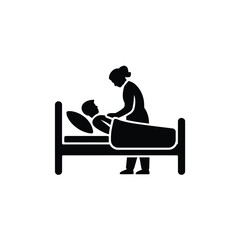 Nurse caring for patient in hospital bed
