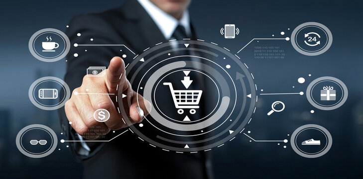 Businessman Touching Digital Shopping Cart Icon with E-commerce Symbols in Modern Background Representing Online Retail and Consumer Engagement